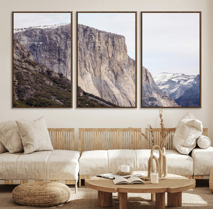 Framed canvas of El Capitan’s vertical granite face in Yosemite with snowy peaks, ideal for Sierra minimalism or mountain-inspired decor.