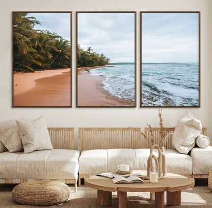 Framed canvas of a tropical beach with palm trees and soft waves, ideal for coastal escape or serene nature-inspired home decor.