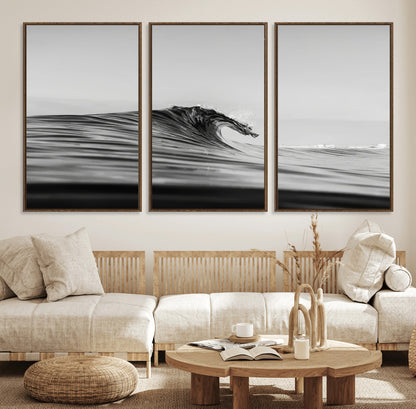 Striking black and white photo of a curling wave, ideal for modern coastal or minimalist wall decor settings.