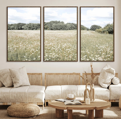 Soft-toned image of a wild daisy field under a cloudy sky, ideal for neutral or Scandinavian-inspired home decor.