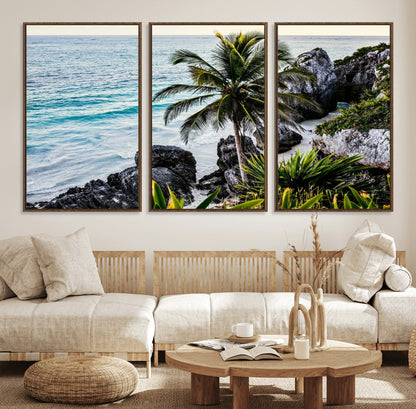 Framed canvas of a vibrant tropical coastline with palm trees, rocky cliffs, and turquoise waters, ideal for tropical coastal home decor.