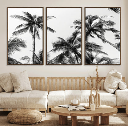 Black and white canvas of tall palm trees in moody tones, perfect for modern tropical minimalist or coastal-style home decor.