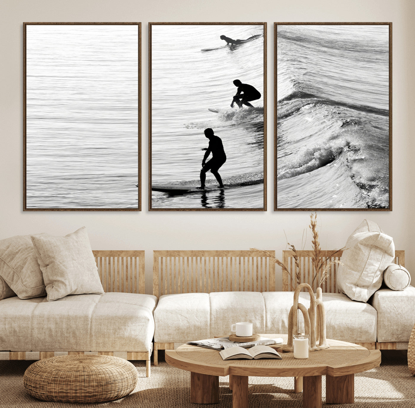 Black and white photo of surfers riding waves in a moody, high-contrast scene, ideal for modern coastal or surf-inspired home decor.