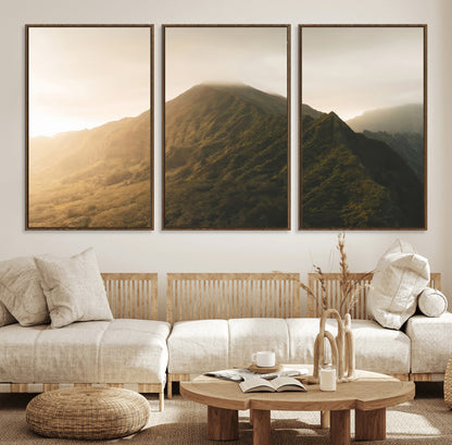 Sunlit mountain peak with mist rolling over its rugged slopes, bathed in golden light, creating a warm and tranquil nature-inspired scene.