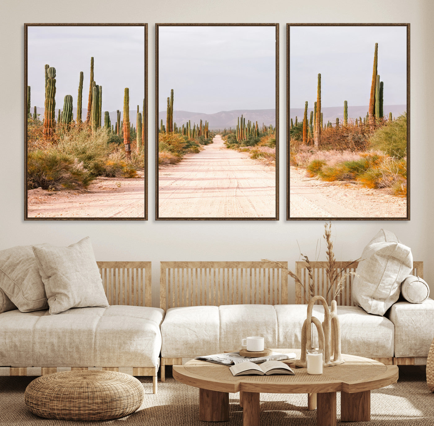 A desert road lined with saguaro cacti under a golden sky, creating a warm southwestern feel, perfect for boho or rustic decor.