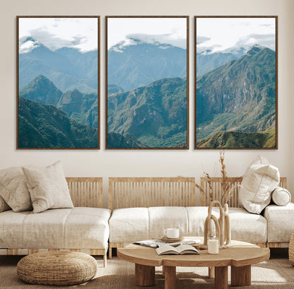 A misty mountain landscape with cloud-covered Andean peaks and lush green valleys, creating a dramatic and serene view, perfect for rustic or nature-inspired home decor.