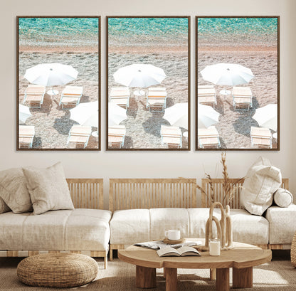 A bright beach scene with white umbrellas, pastel sand, and turquoise waters, creating a tranquil coastal vibe, perfect for beach house or summer decor.