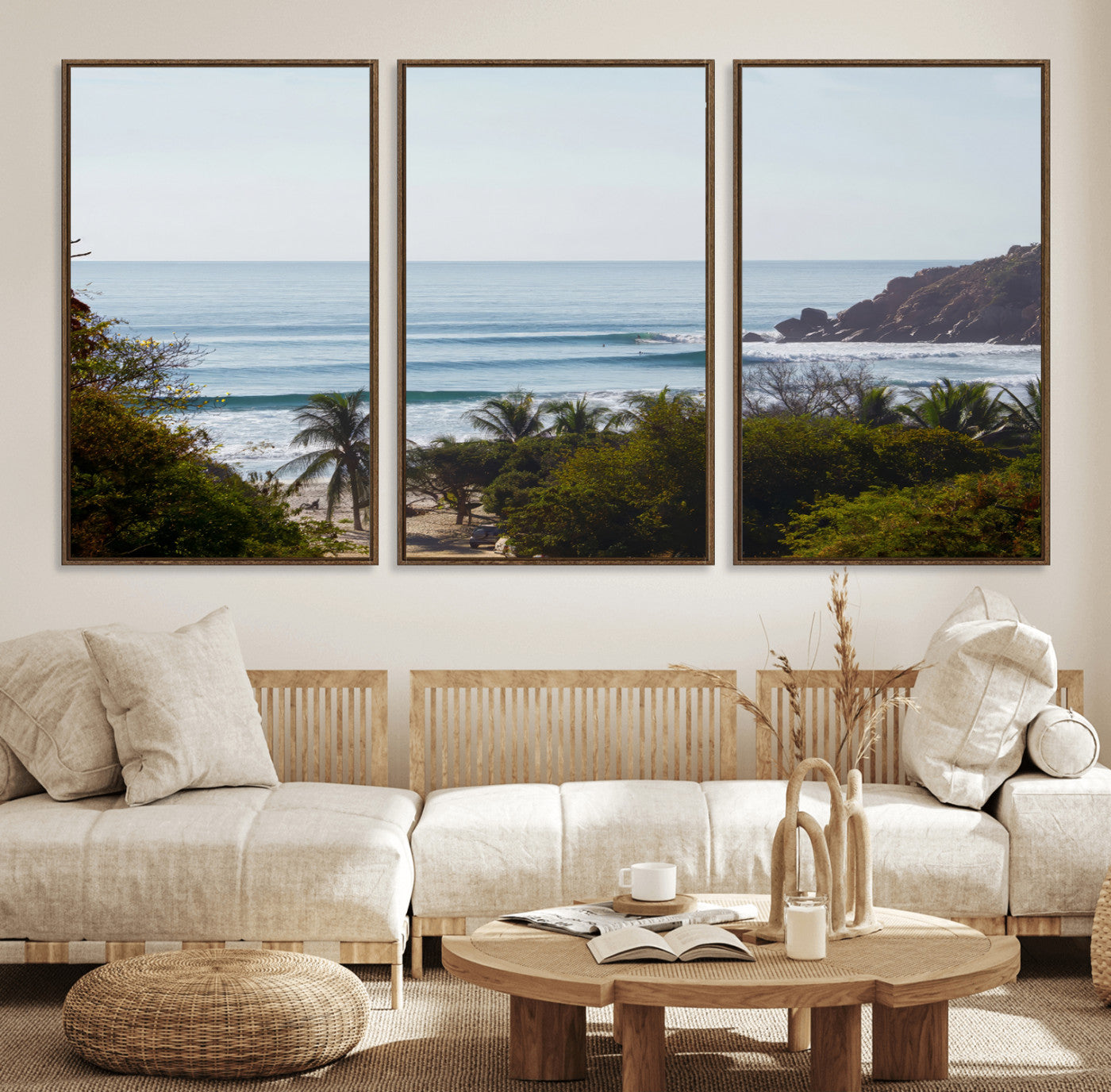 View of calm ocean waves with palm trees and a tropical coastline, ideal for coastal boho or beach-themed wall decor.