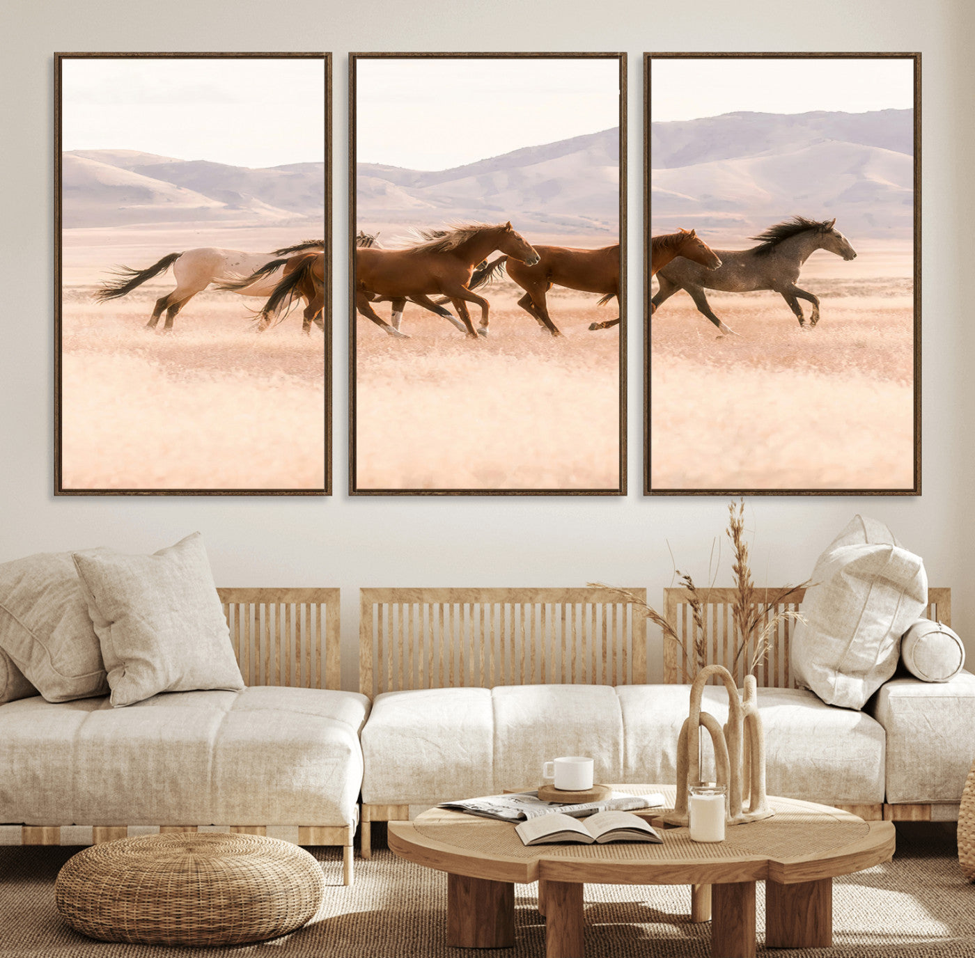 A herd of wild horses galloping through a sunlit desert plain with mountains in the background, perfect for rustic or western-themed wall decor.