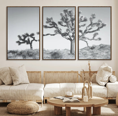 Black and white Joshua tree in a desert landscape with soft light and dry brush, perfect for rustic or minimalist home decor.