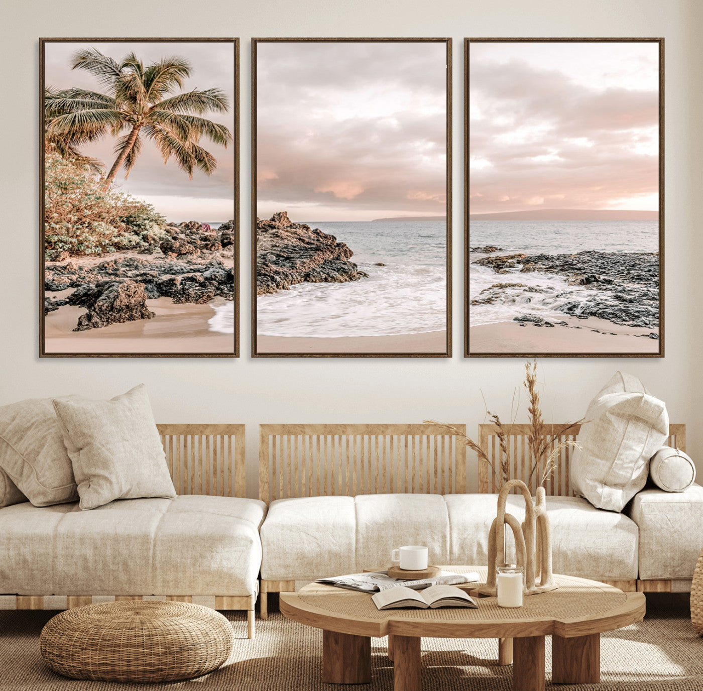 A peaceful beach scene with a palm tree and rocks, soft waves washing onto the shore under a soft pastel sky at sunset.
