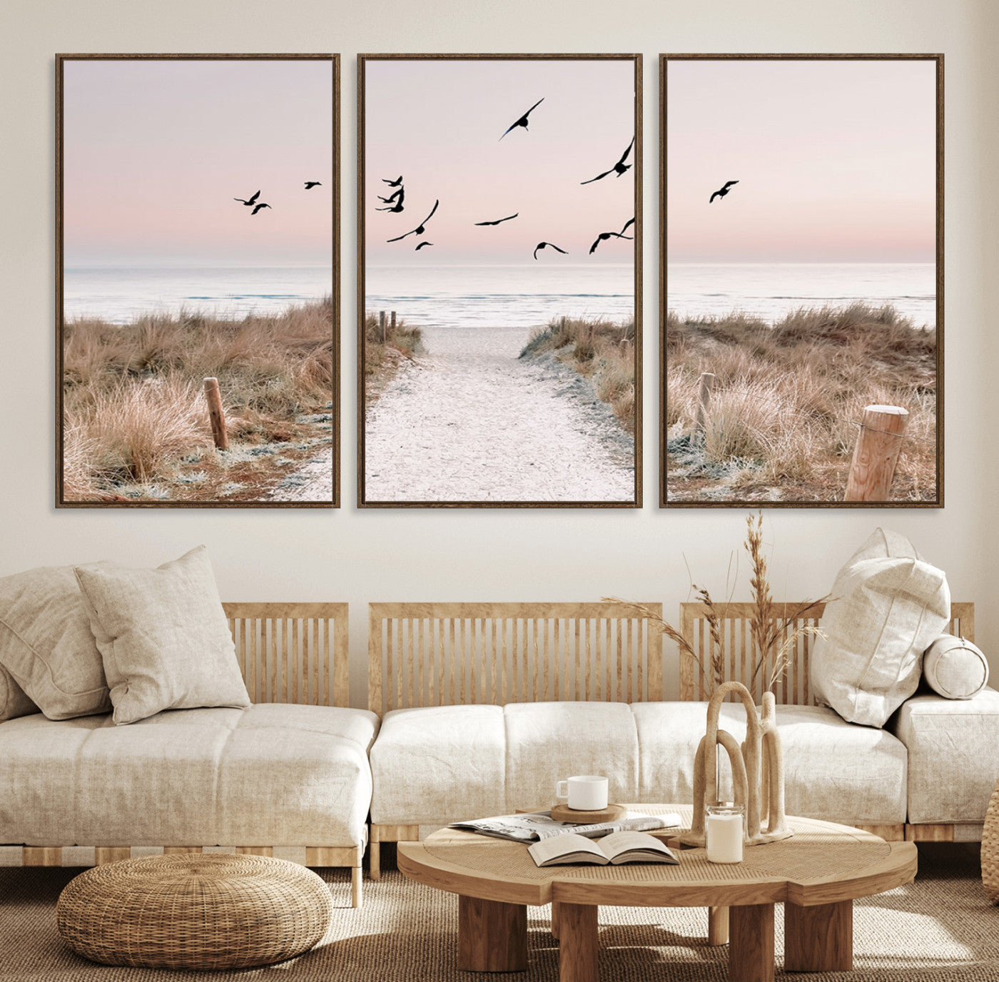 A peaceful coastal pathway leading to the ocean, with birds flying across a soft pastel sky, creating a calm and scenic beach atmosphere.