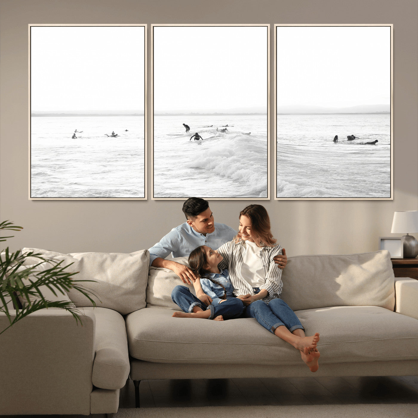 Monochrome photo of surfers riding and waiting on ocean waves, ideal for surf-themed or coastal energy wall decor.