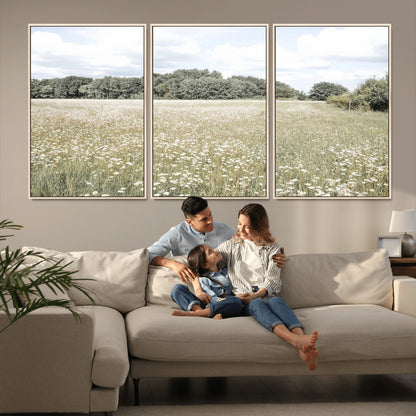 Soft-toned image of a wild daisy field under a cloudy sky, ideal for neutral or Scandinavian-inspired home decor.