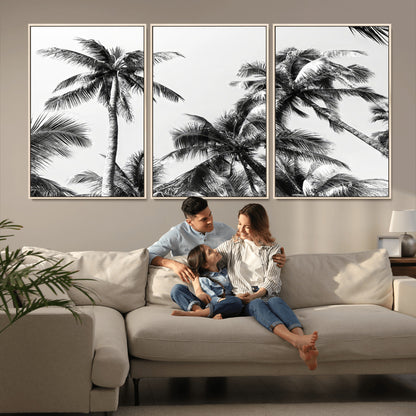 Black and white canvas of tall palm trees in moody tones, perfect for modern tropical minimalist or coastal-style home decor.