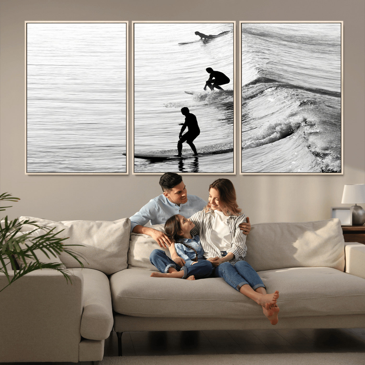 Black and white photo of surfers riding waves in a moody, high-contrast scene, ideal for modern coastal or surf-inspired home decor.