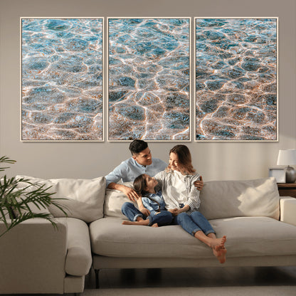 Close-up of sunlit ocean ripples with aqua blue and golden tones, ideal for modern coastal or minimalist home decor.