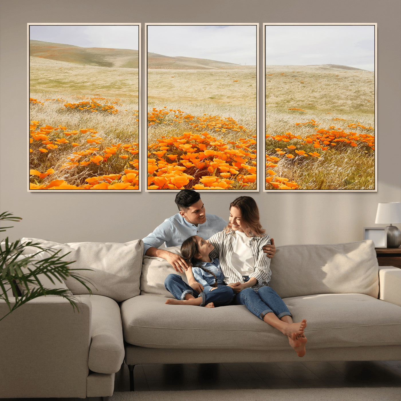 A golden field with vibrant orange poppies blooming across rolling hills under a soft, sunlit sky, creating a warm and rustic landscape.