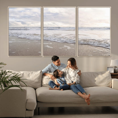 Peaceful ocean waves rolling onto the sandy shore under soft light, perfect for neutral or coastal minimalist decor themes.