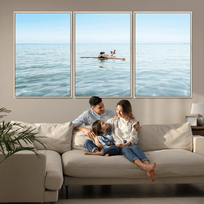 A peaceful minimalist scene of a person floating on crystal-clear water, surrounded by a vast open horizon, capturing relaxation and serenity in a tranquil aquatic setting.