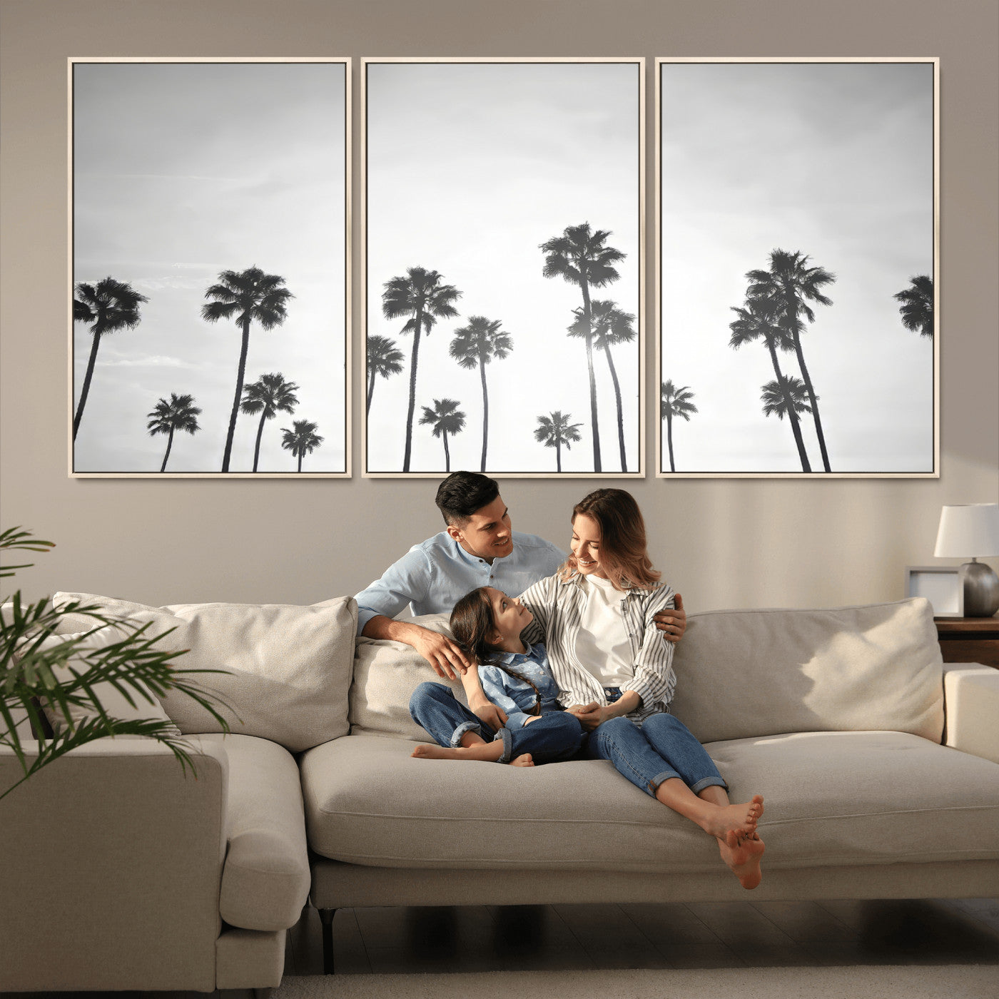 A black and white minimalist scene featuring tall palm trees silhouetted against a bright sky, creating a dreamy and timeless tropical aesthetic.