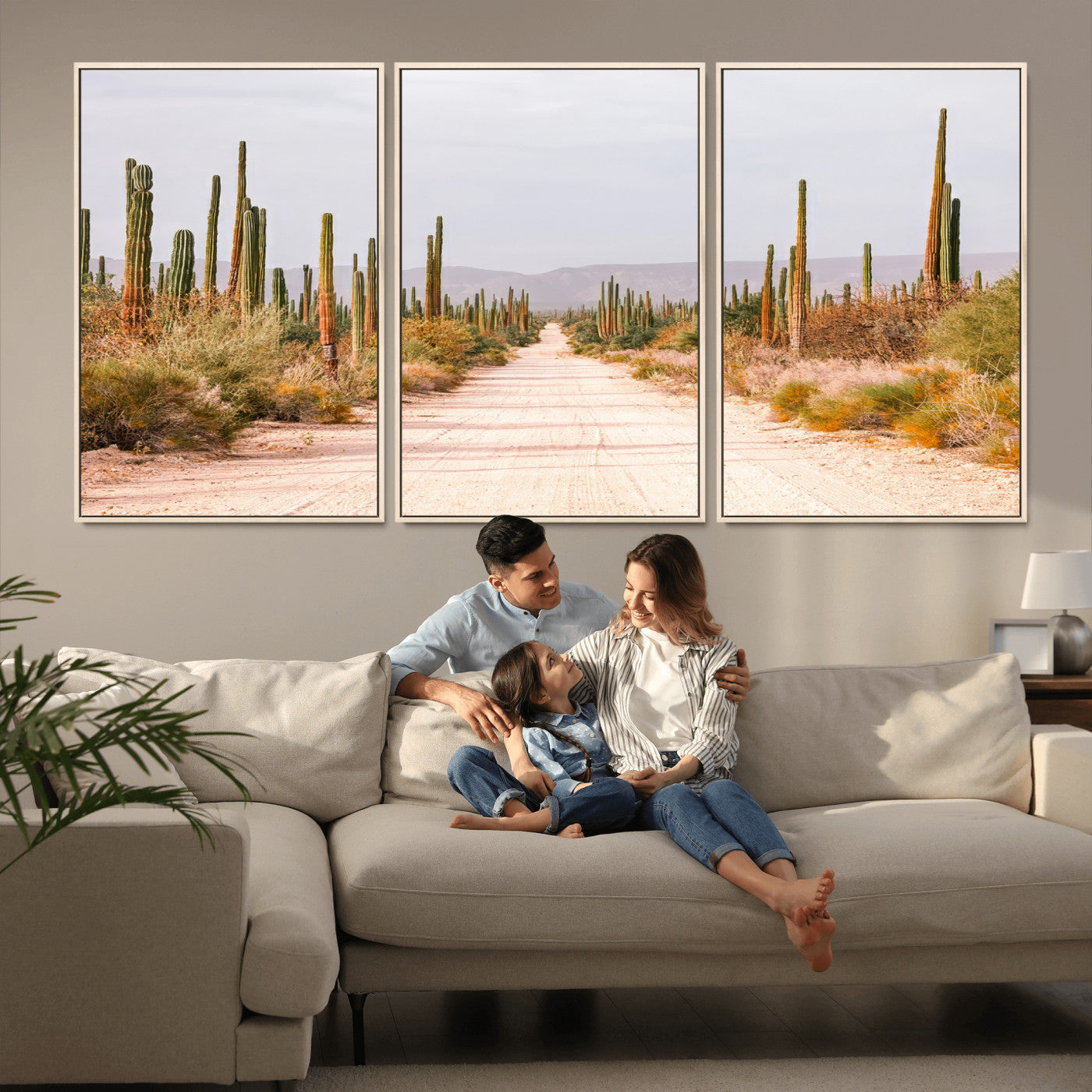 A desert road lined with saguaro cacti under a golden sky, creating a warm southwestern feel, perfect for boho or rustic decor.