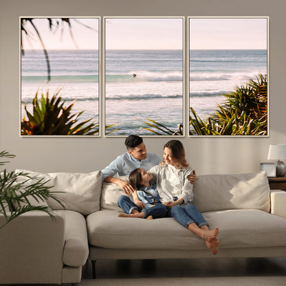 Canvas of a lone surfer riding a pastel wave at sunrise, perfect for tropical or coastal-themed spaces with a relaxed, airy vibe.