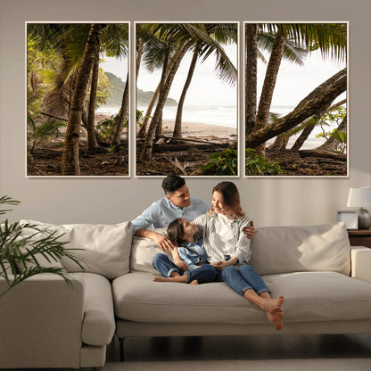 Dense tropical palm trees framing a sandy beach and ocean shore, ideal for jungle or coastal themed interior wall decor.