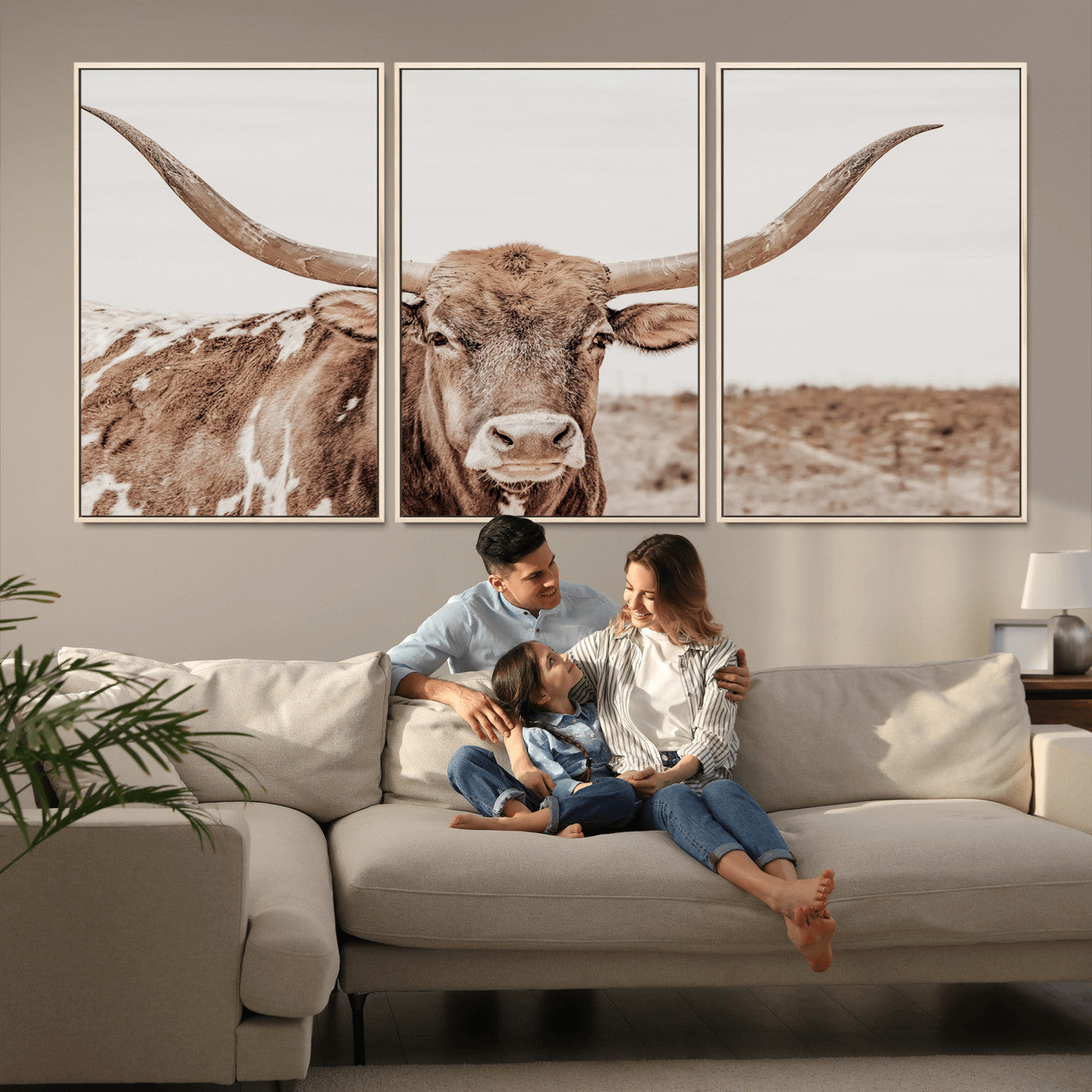 A longhorn cow in soft beige desert tones, standing calmly in open land, perfect for neutral western or rustic farmhouse interiors.