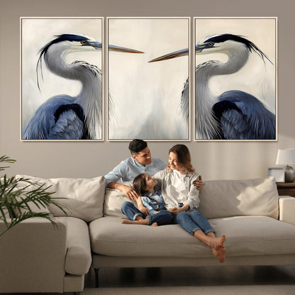 Two blue herons facing each other on a soft neutral background, ideal for coastal, tranquil, or nature-inspired minimalist interiors.
