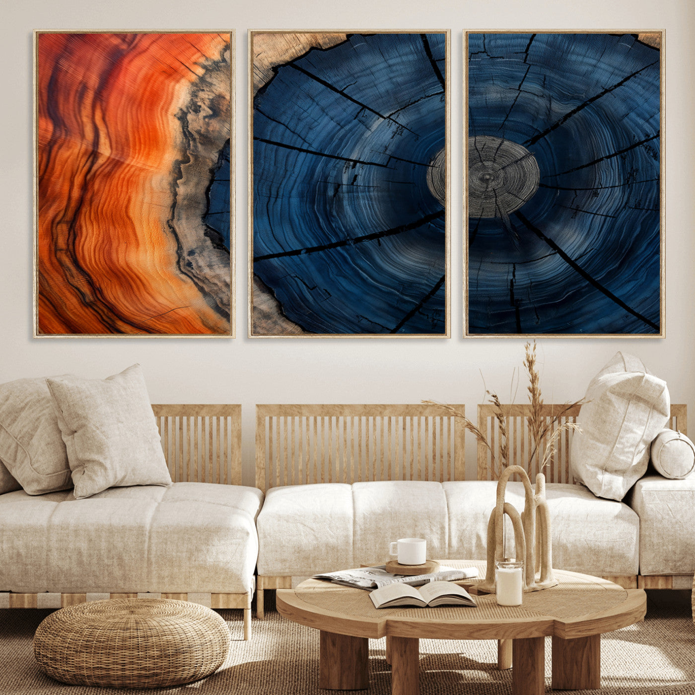 A captivating close-up of a tree trunk, showcasing its concentric rings in rich shades of blue, orange, and brown, highlighting the organic patterns of natural wood.
