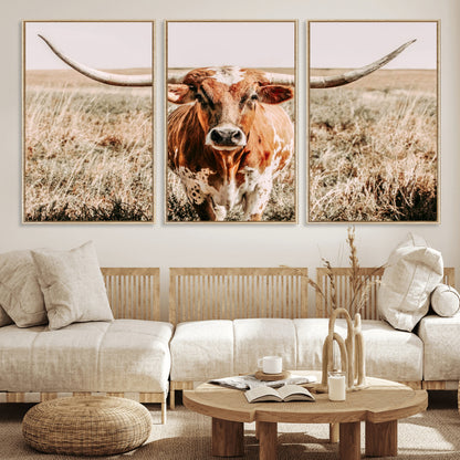 Framed longhorn cow canvas wall art with rustic prairie background, western animal print perfect for farmhouse or ranch style decor