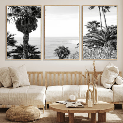 Monochrome canvas of palm trees framing a coastal surf scene, perfect for California-inspired or retro black-and-white beach decor.