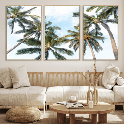 Framed canvas of tall palm trees reaching into a tropical sky, ideal for beach home or relaxed island-inspired wall decor.