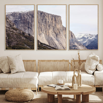 Framed canvas of El Capitan’s vertical granite face in Yosemite with snowy peaks, ideal for Sierra minimalism or mountain-inspired decor.