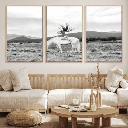 Black and white photo of a woman on a white horse in moody tones, ideal for Western Boho or modern rustic-style home decor.