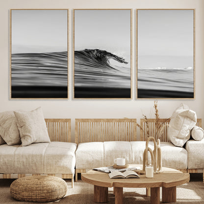 Striking black and white photo of a curling wave, ideal for modern coastal or minimalist wall decor settings.
