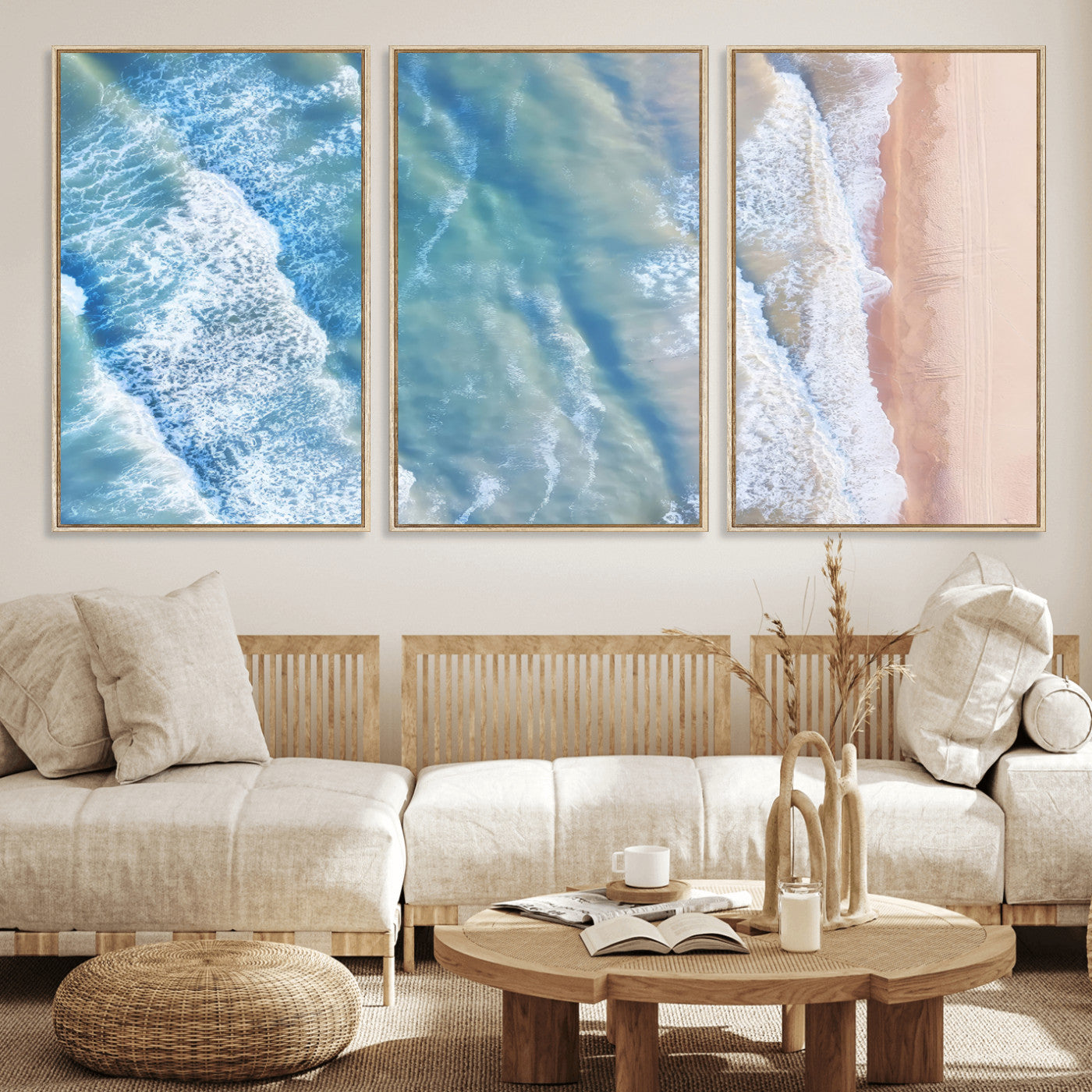 Aerial photo of soft blue waves meeting sandy shore, perfect for modern coastal or beach-themed decor with a light and tranquil aesthetic.