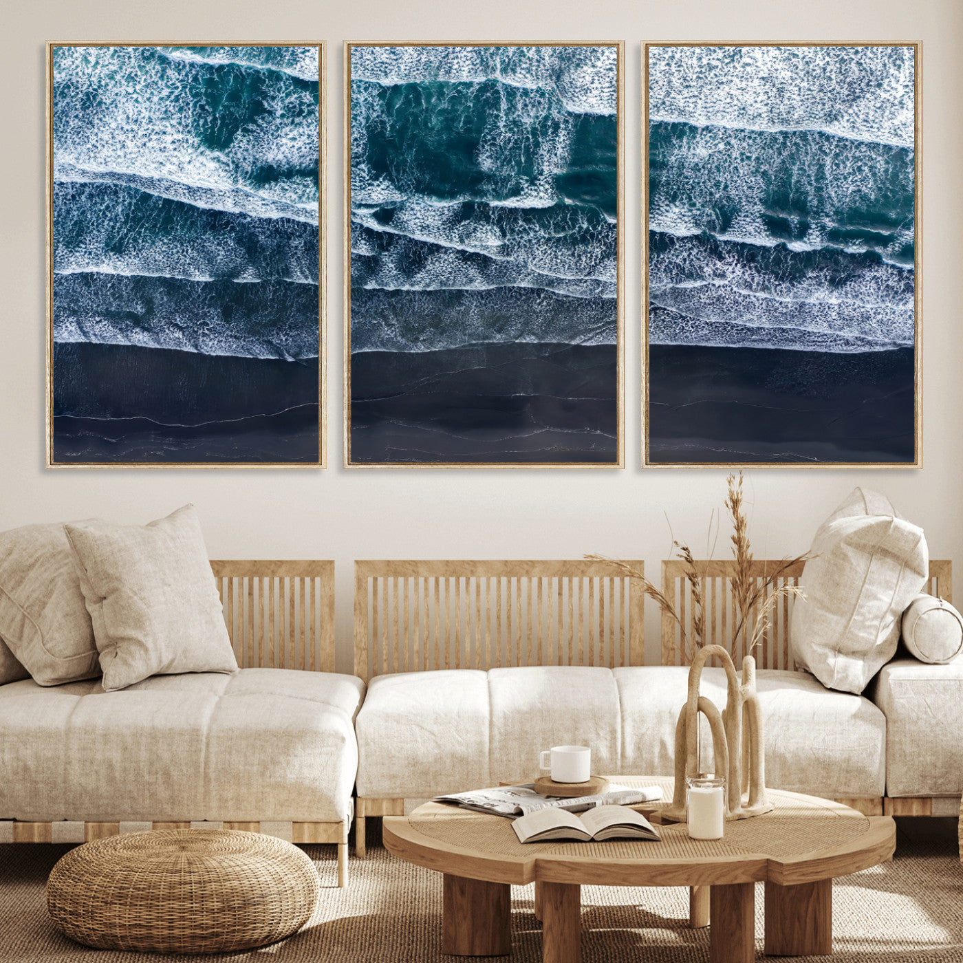 Canvas of aerial ocean waves crashing onto a black sand beach in moody tones, ideal for modern coastal or minimalist home decor.