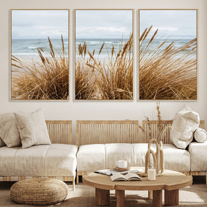 Canvas of golden beach grass swaying by the ocean under a soft cloudy sky, perfect for neutral-toned or coastal minimalist decor.