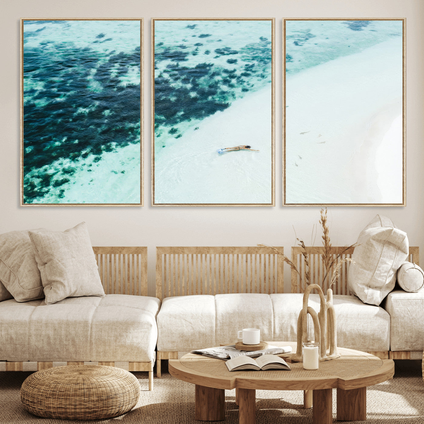 Canvas featuring an aerial view of a swimmer in shallow turquoise waters with coral patterns, ideal for tropical coastal home decor.