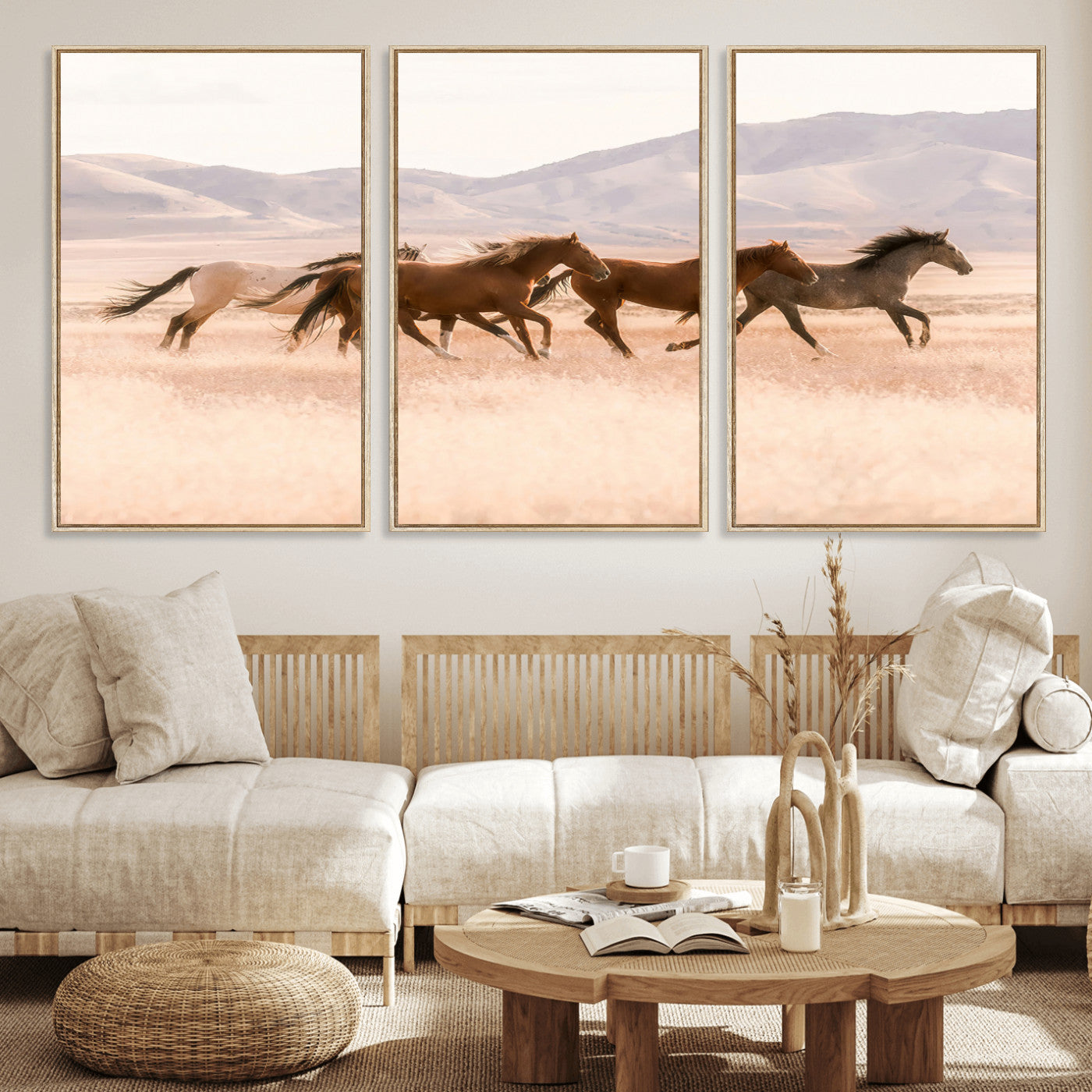 A herd of wild horses galloping through a sunlit desert plain with mountains in the background, perfect for rustic or western-themed wall decor.
