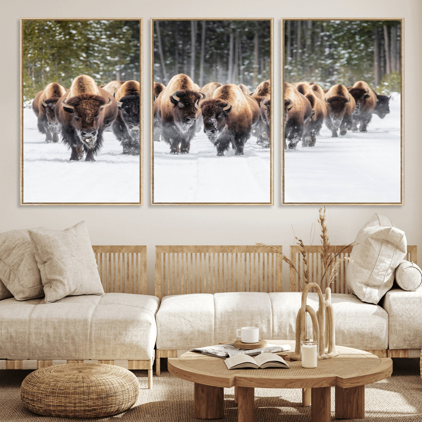 A herd of American bisons walking through a snowy forest path, perfect for rustic cabin or Western-themed wall decor.
