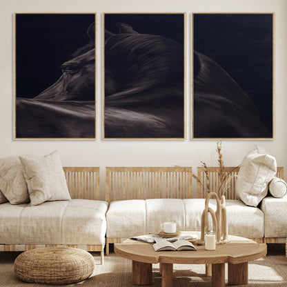 Close-up of a black horse with dramatic lighting on a dark background, perfect for rustic or masculine home decor.