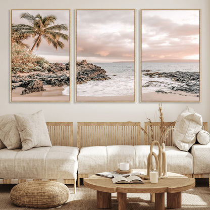 A peaceful beach scene with a palm tree and rocks, soft waves washing onto the shore under a soft pastel sky at sunset.