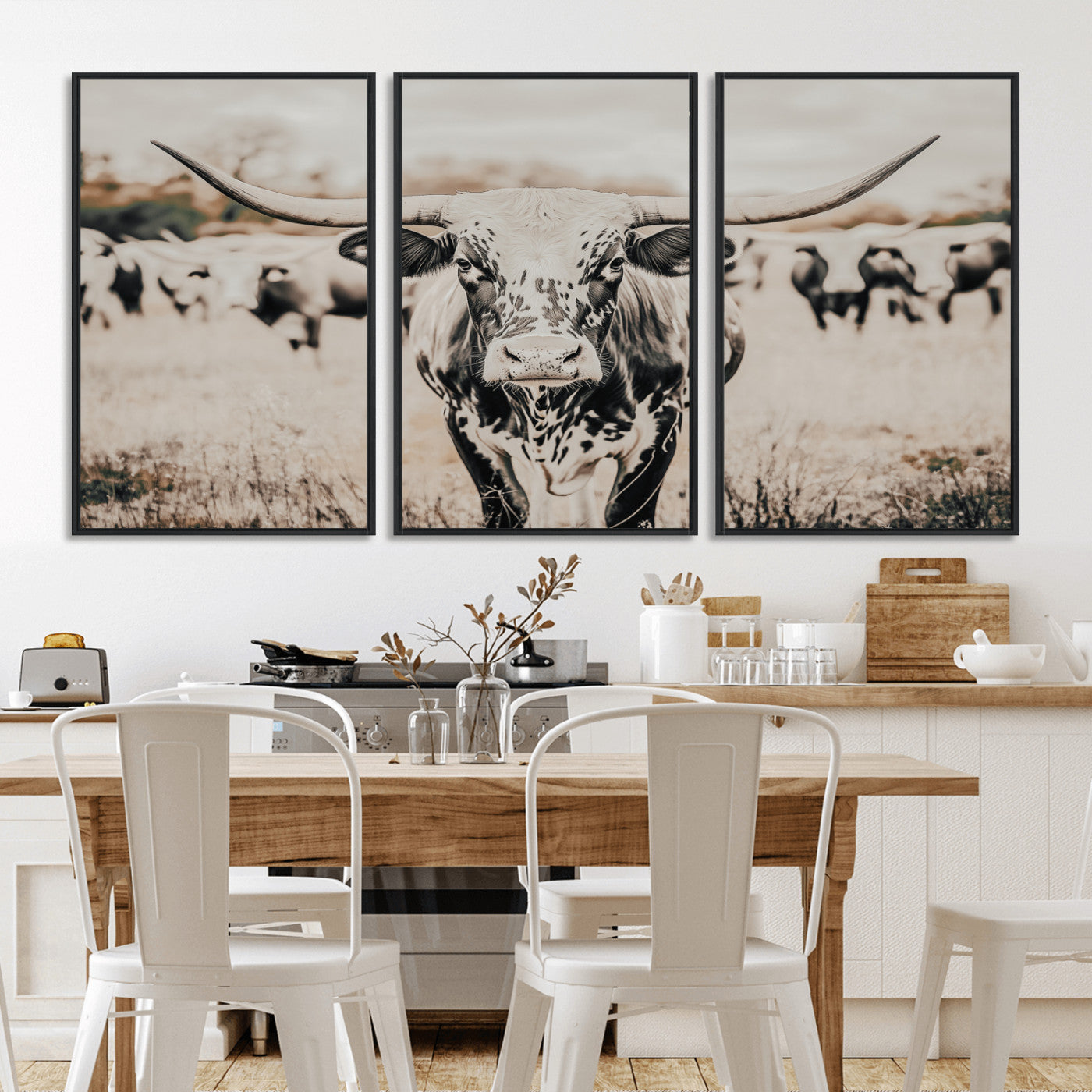Canvas of a speckled Texas longhorn standing boldly in a field with a herd behind, perfect for rustic western or farmhouse wall decor.
