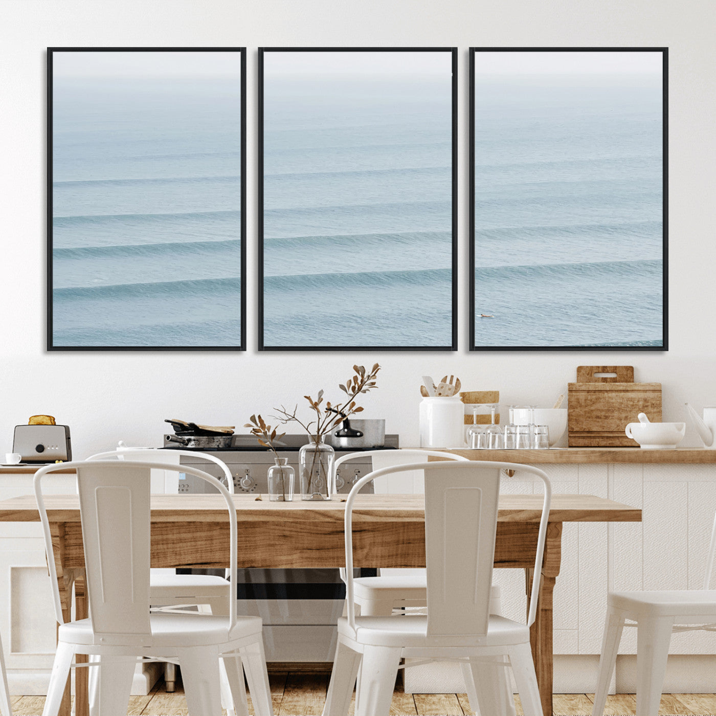 Framed canvas of repeating ocean waves with a distant solo surfer, ideal for minimalist ocean or calm coastal wall decor.