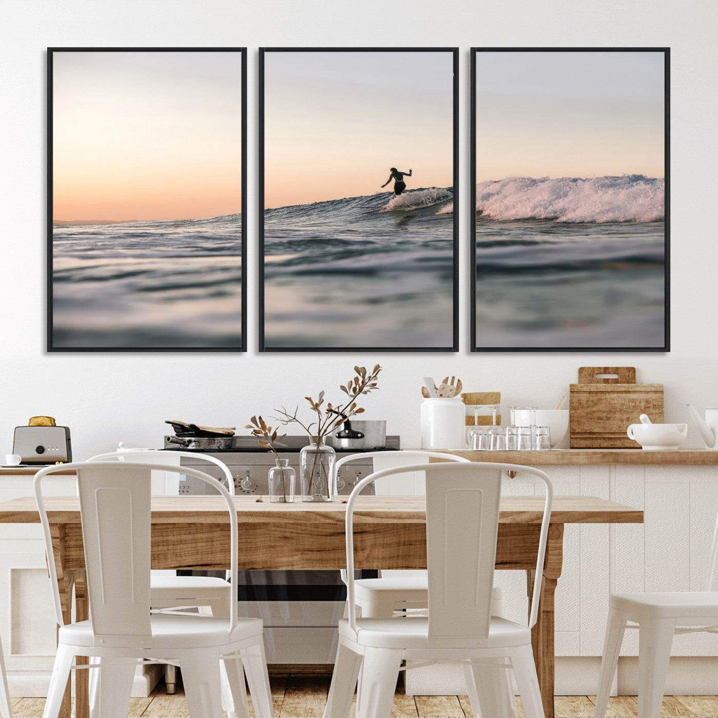 Framed canvas of a female surfer balancing on a wave at sunset, perfect for serene surf or ocean-inspired coastal decor.