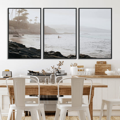 Framed canvas of a surfer in misty coastal tones at a foggy California beach, ideal for minimalist coastal beach or serene ocean-themed decor.
