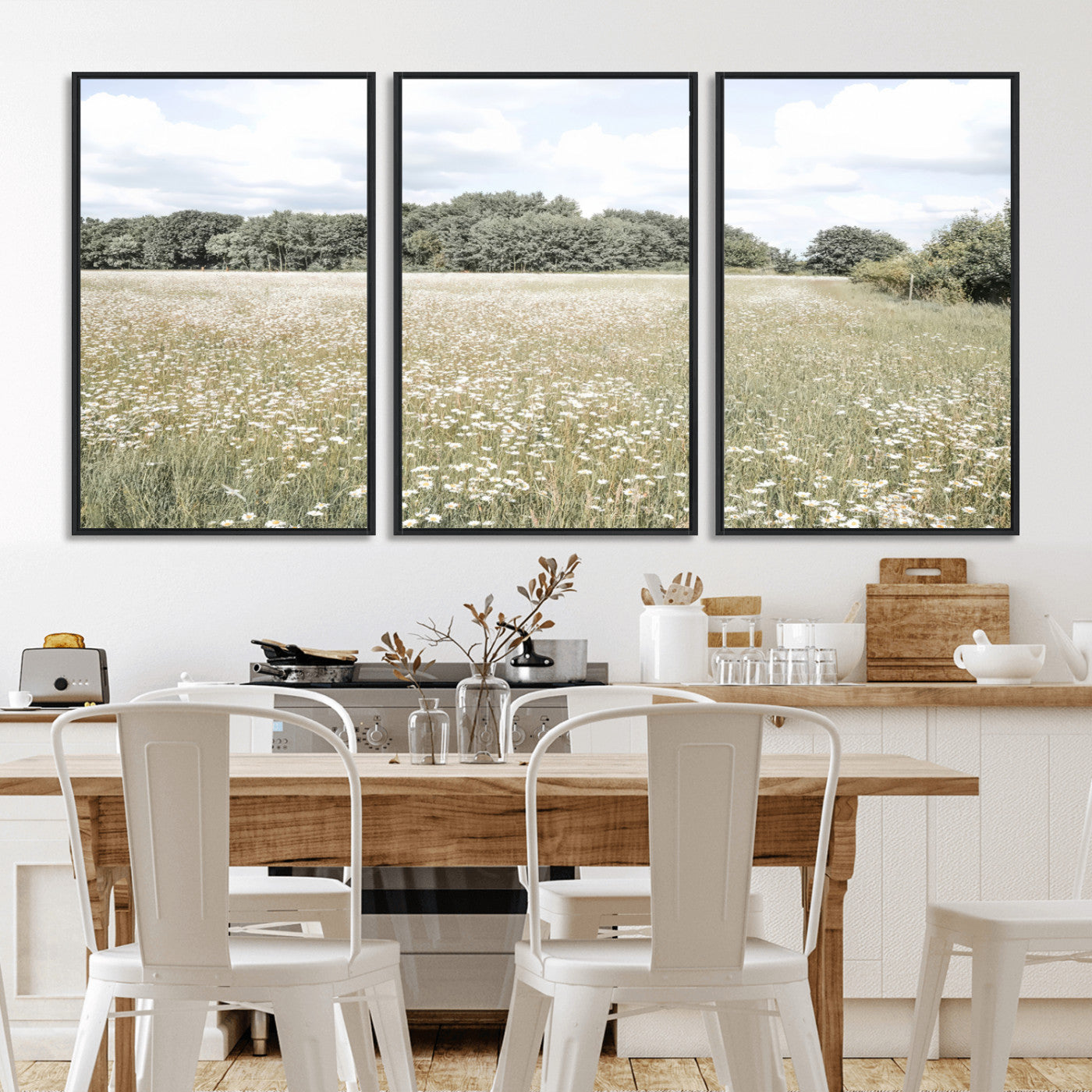 Soft-toned image of a wild daisy field under a cloudy sky, ideal for neutral or Scandinavian-inspired home decor.